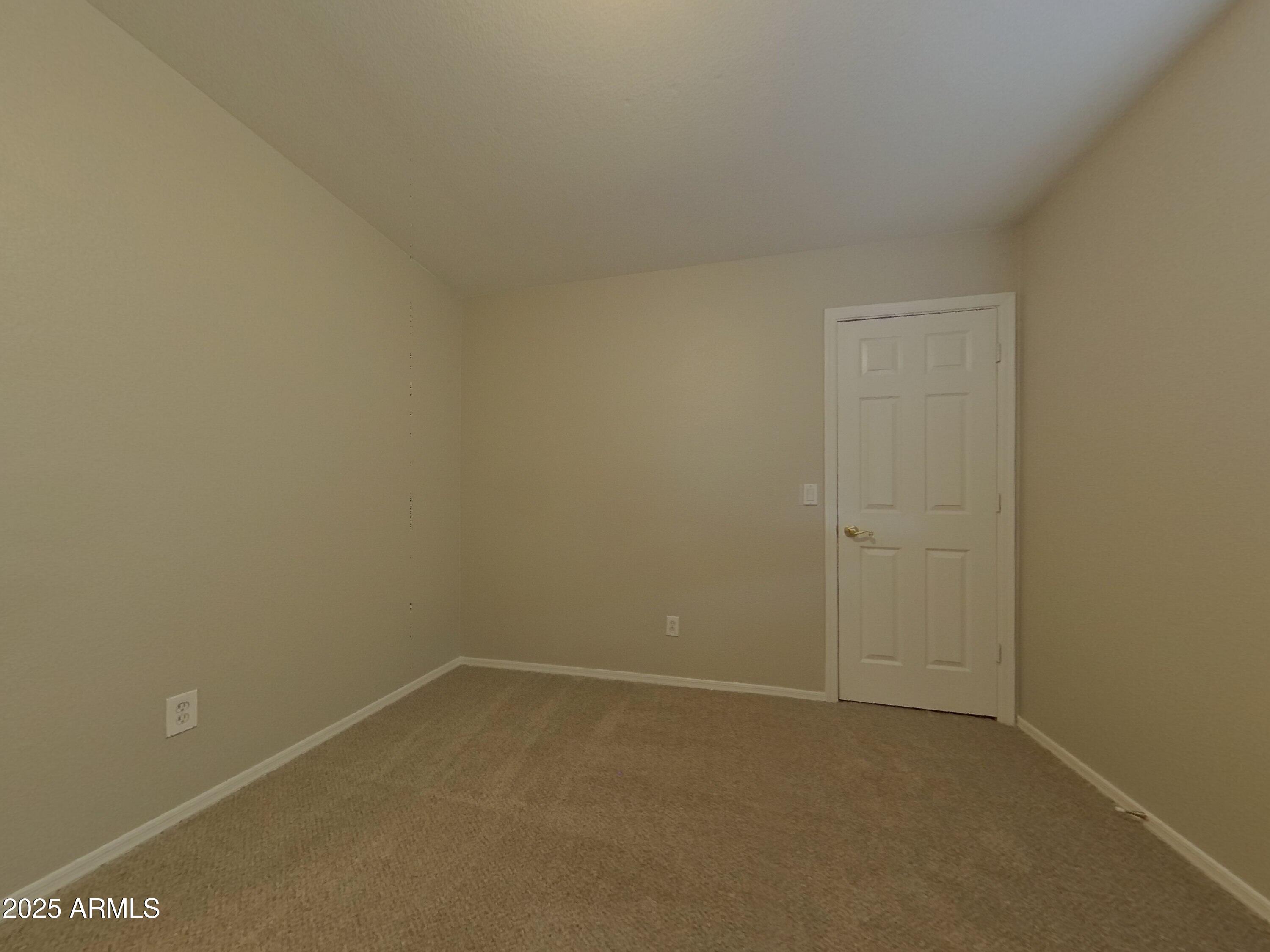 10365 West Piccadilly Road Avondale, AZ 85392 - Photo 12 of 20 a room that has a window in it