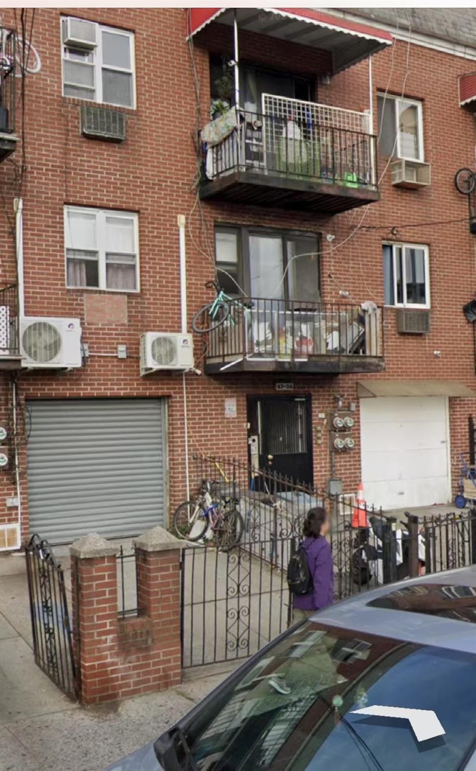 a front view of a house with balcony