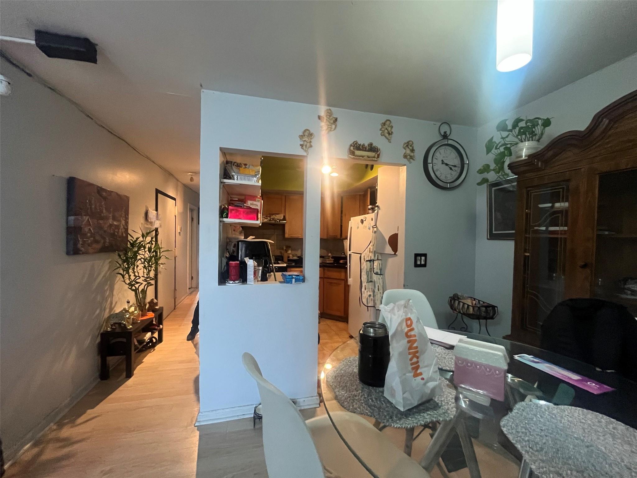 43-10 111th Street Queens, NY 11368 - Photo 4 of 7 a living room with furniture and a flat screen tv