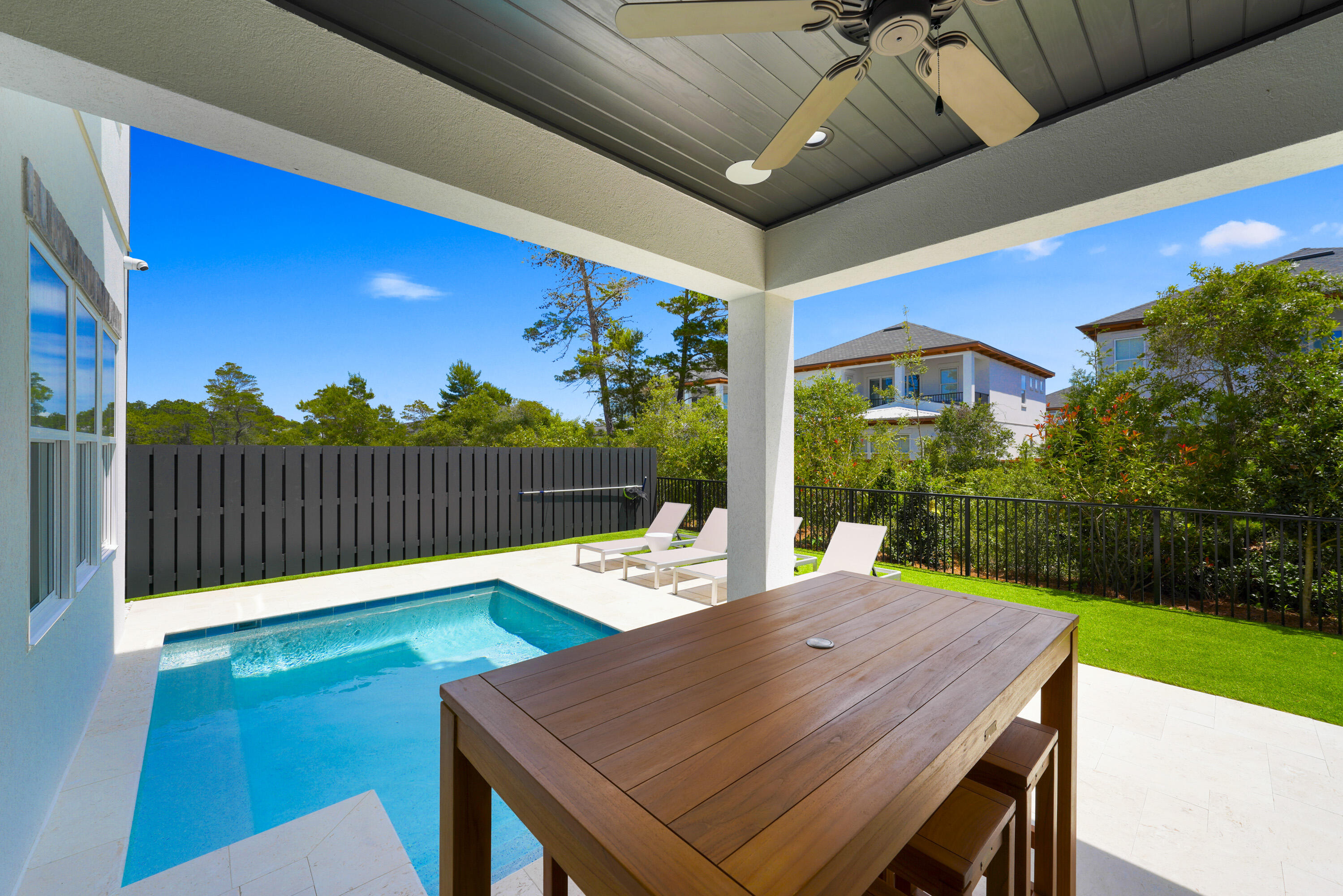 56 Sea Croft Cove Santa Rosa Beach, FL 32459 - Photo 10 of 65 a view of a patio with wooden floor