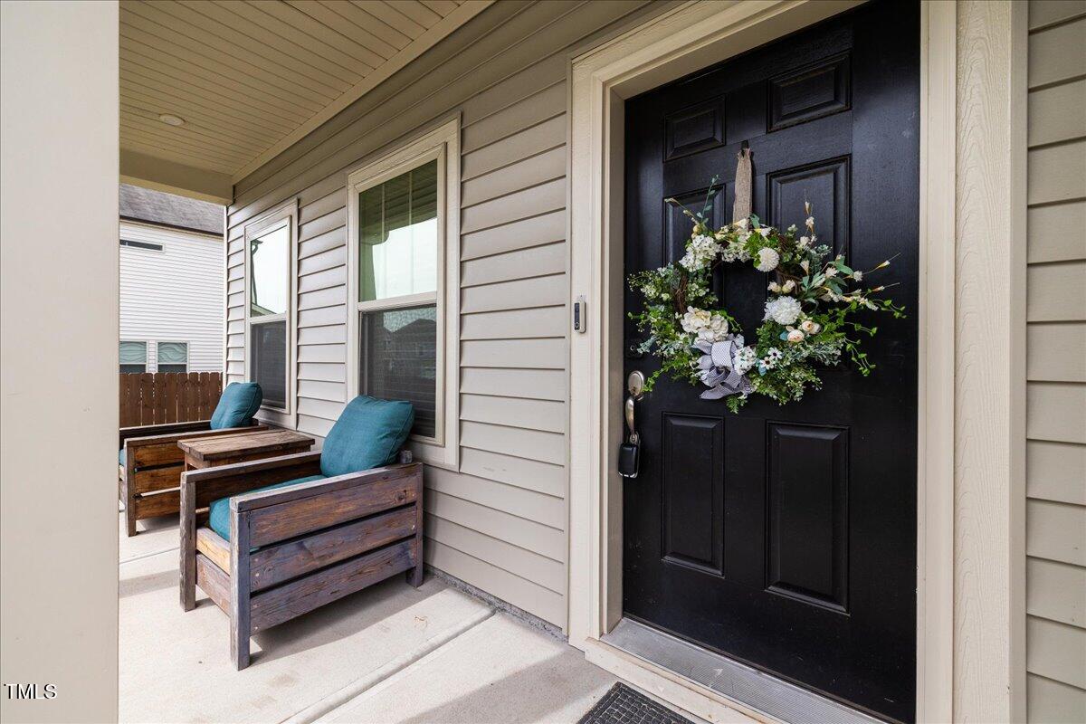 1610 Stone Road Durham, NC 27703 - Photo 2 of 40 a view of a balcony with furniture