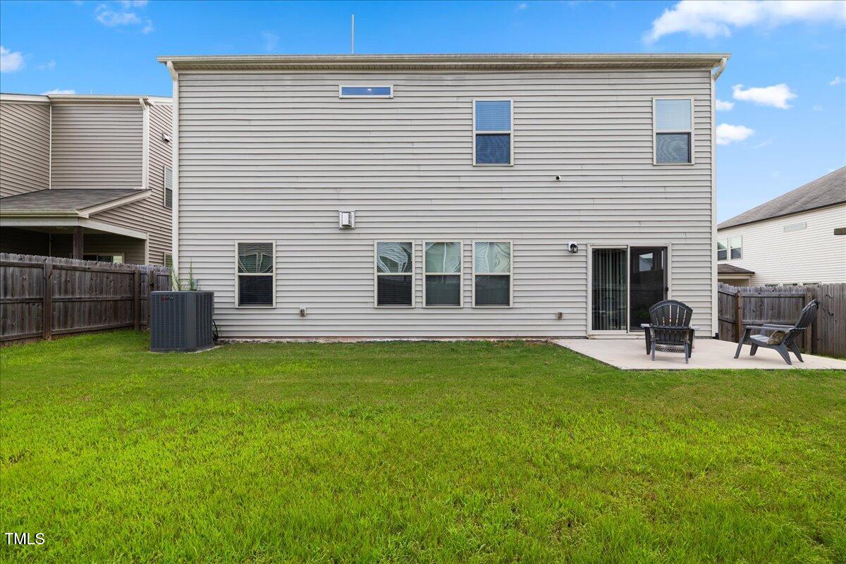 1610 Stone Road Durham, NC 27703 - Photo 29 of 40 a view of a house with backyard and sitting area