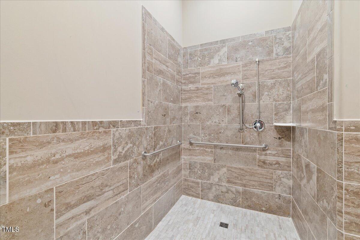 1610 Stone Road Durham, NC 27703 - Photo 37 of 40 a bathroom with a shower