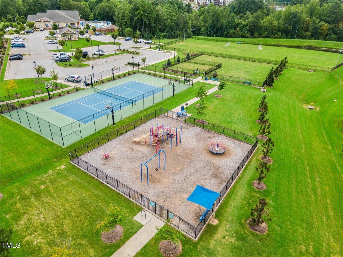 1610 Stone Road Durham, NC 27703 - Photo 39 of 40 a view of a swimming pool with a patio