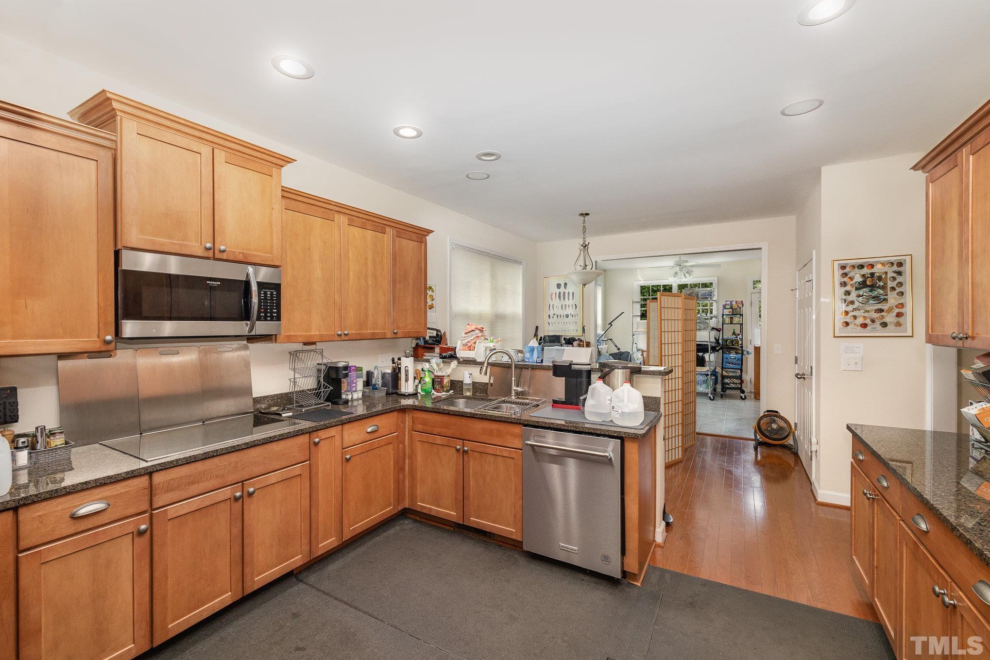 306 Few Circle Durham, NC 27705 - Photo 11 of 28 a kitchen with lots of counter top space sink and stainless steel appliances