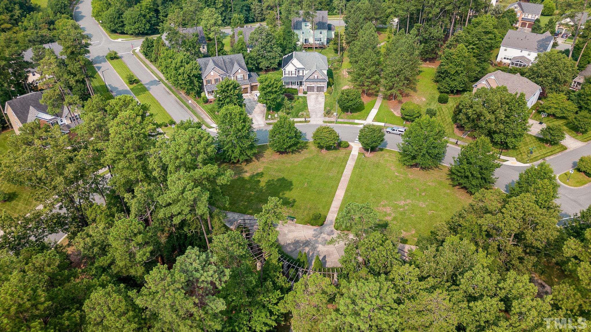 306 Few Circle Durham, NC 27705 - Photo 4 of 28 an aerial view of residential house with outdoor space and trees all around