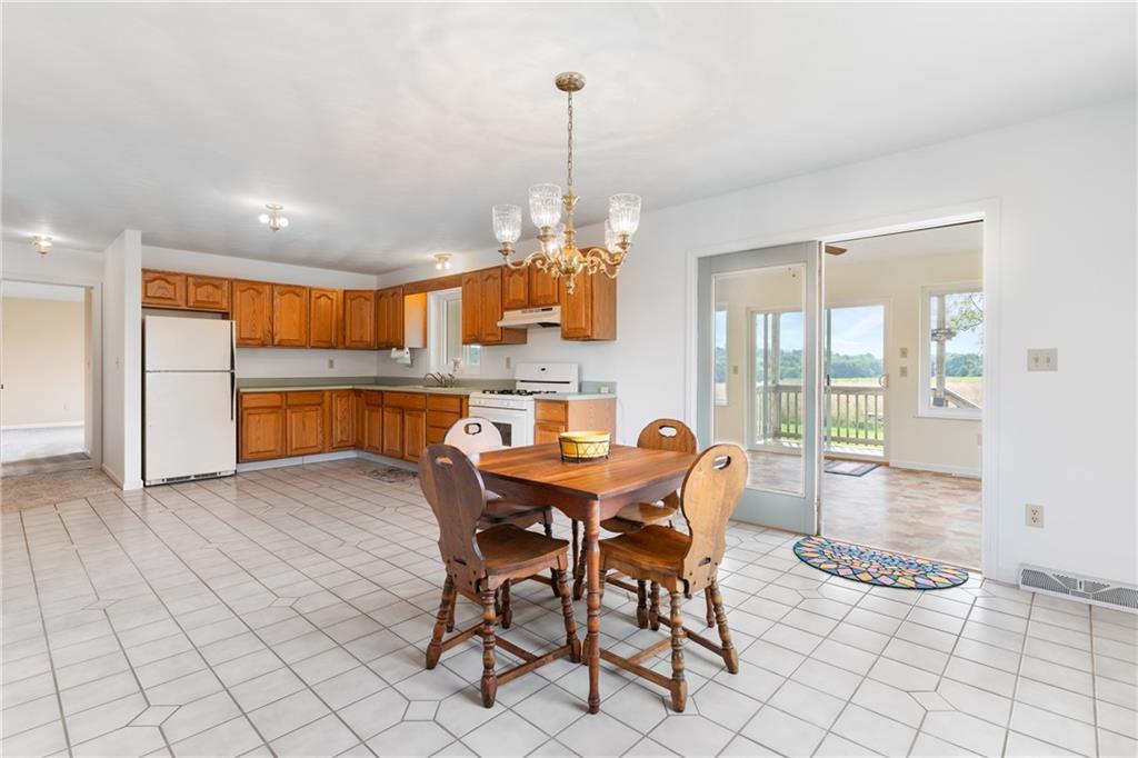 3298 Miola Road Clarion, PA 16214 - Photo 7 of 38 a view of a dining room with furniture window and outside view