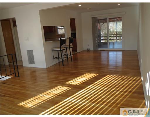 1 Barlow Road Edison, NJ 08817 - Photo 5 of 17 a view of a living room filled with furniture