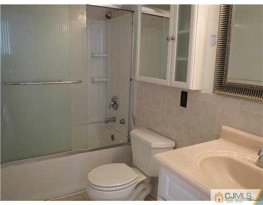 1 Barlow Road Edison, NJ 08817 - Photo 10 of 17 a bathroom with a toilet and a shower