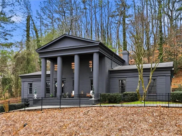 front view of a house with a small yard