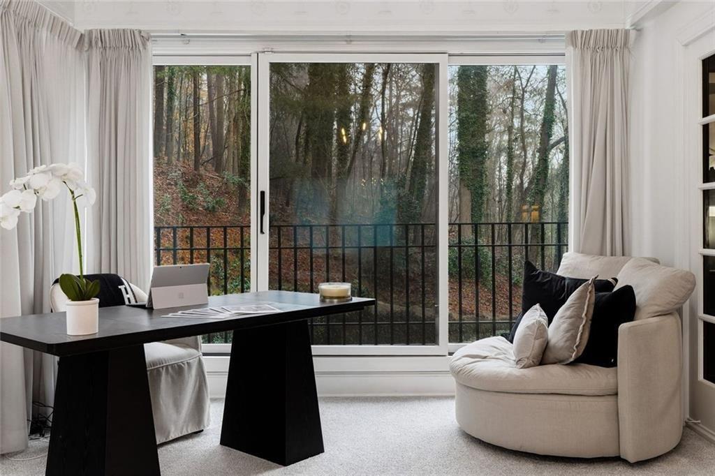 2525 Spalding Drive Atlanta, GA 30350 - Photo 29 of 58 a living room with furniture and a large window