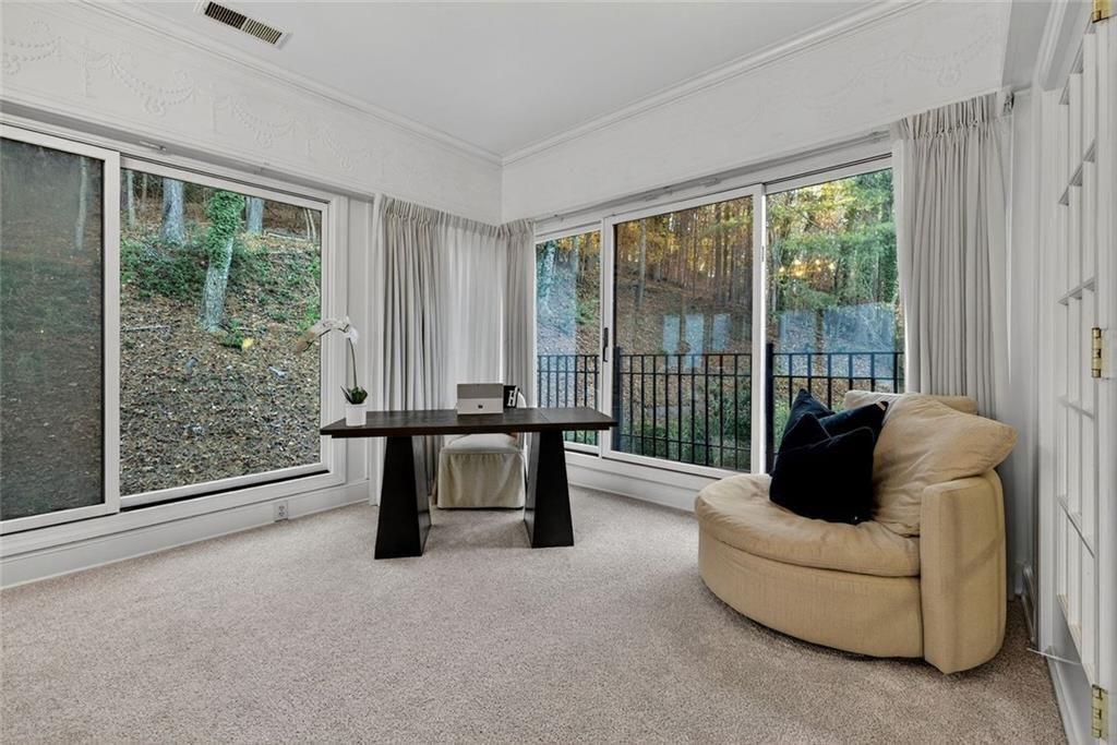 2525 Spalding Drive Atlanta, GA 30350 - Photo 30 of 58 a living room with furniture and a large window
