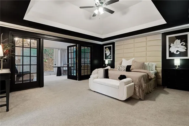 a living room with furniture and a night stand