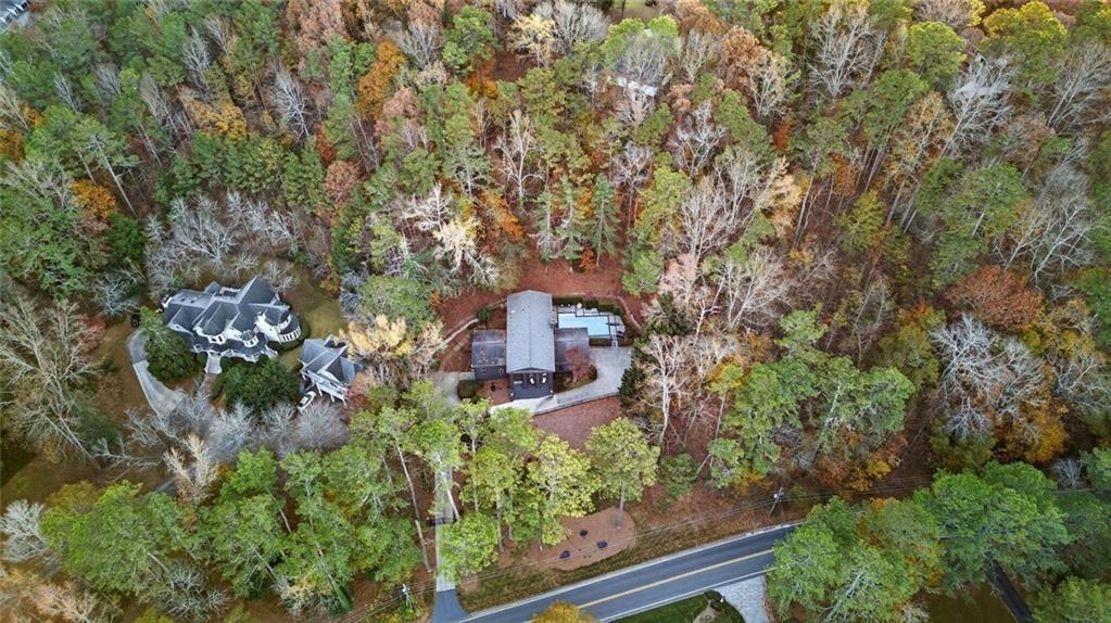 2525 Spalding Drive Atlanta, GA 30350 - Photo 57 of 58 an aerial view of a house with a yard