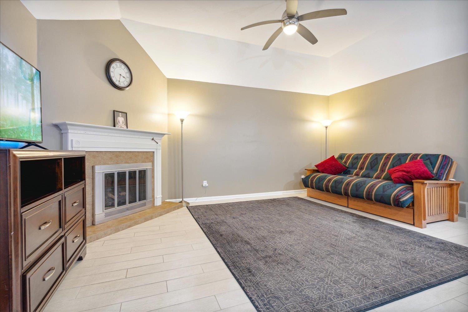 1503 Wolf Ridge Drive Collierville, TN 38017 - Photo 8 of 29 Living room with light wood-type flooring, lofted ceiling, and ceiling fan