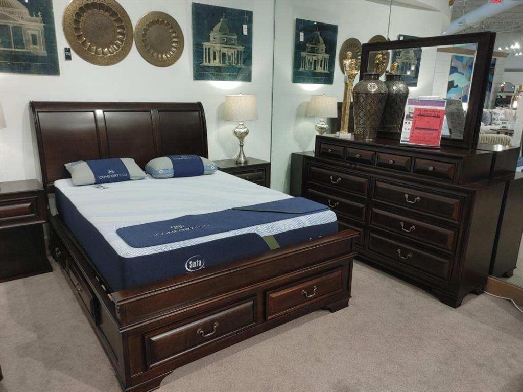 2009 Grey Falcon Circle Southwest Vero Beach, FL 32962 - Photo 8 of 9 a bedroom with a bed and furniture