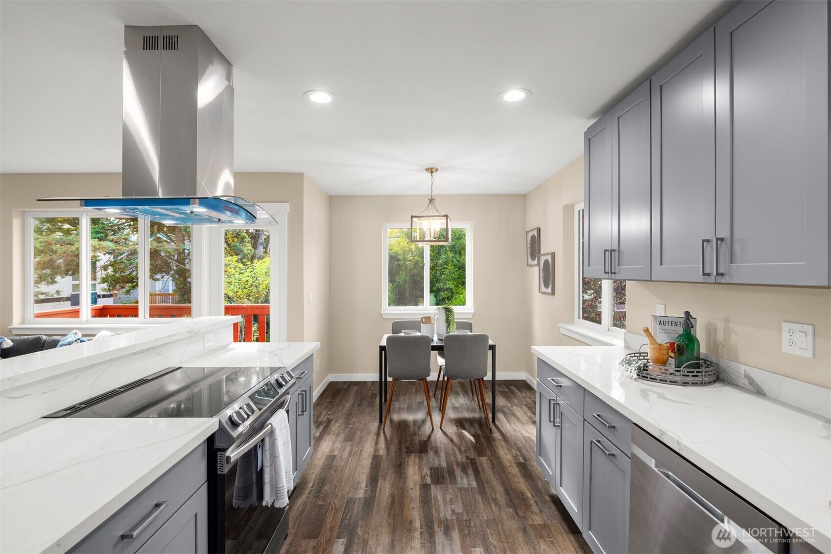 6423 Ellis Avenue South Seattle, WA 98108 - Photo 11 of 28 a kitchen with stainless steel appliances granite countertop a stove a sink and a refrigerator
