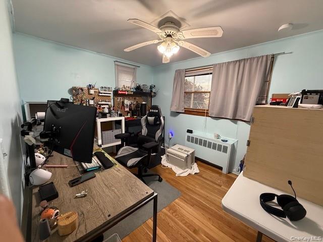 113 Parma Road Island Park, NY 11558 - Photo 4 of 12 a view of a workspace with furniture and a window