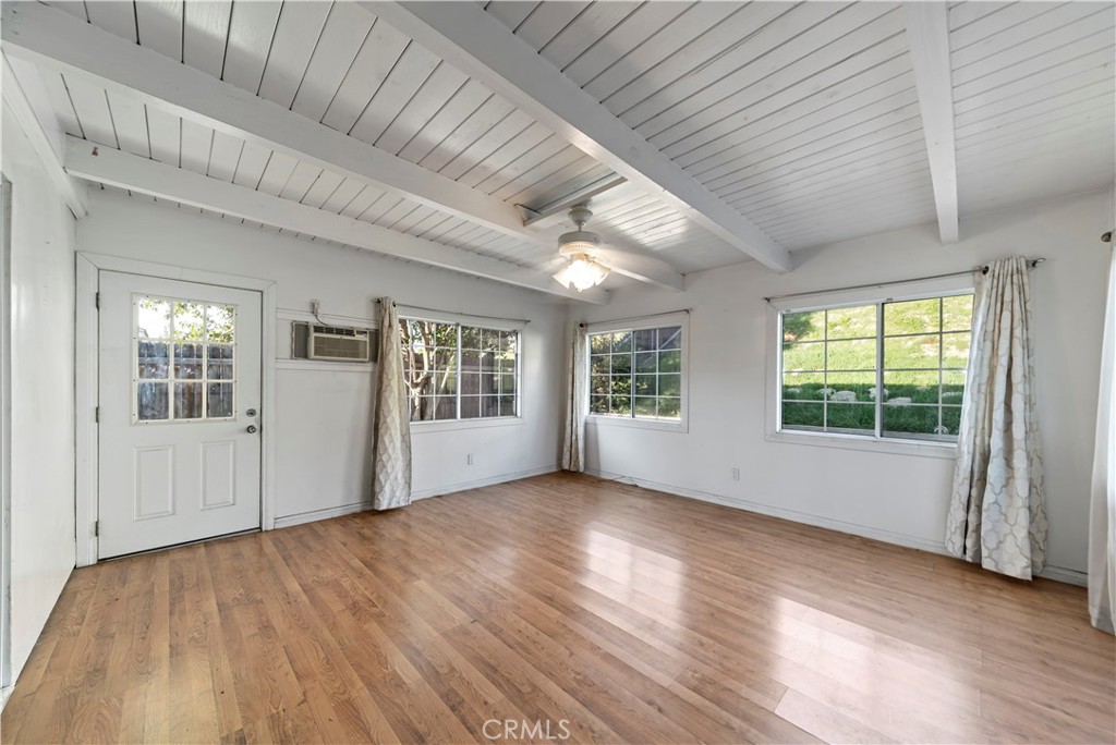 3524 Whitingham Drive West Covina, CA 91792 - Photo 15 of 39 an empty room with wooden floor and windows