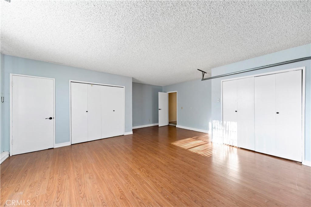 3524 Whitingham Drive West Covina, CA 91792 - Photo 16 of 39 a view of an empty room with wooden floor