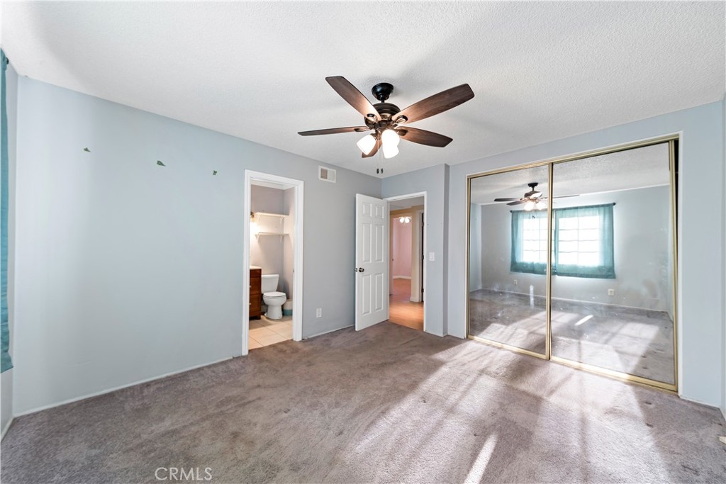 3524 Whitingham Drive West Covina, CA 91792 - Photo 18 of 39 a view of a livingroom with a chandelier fan and windows