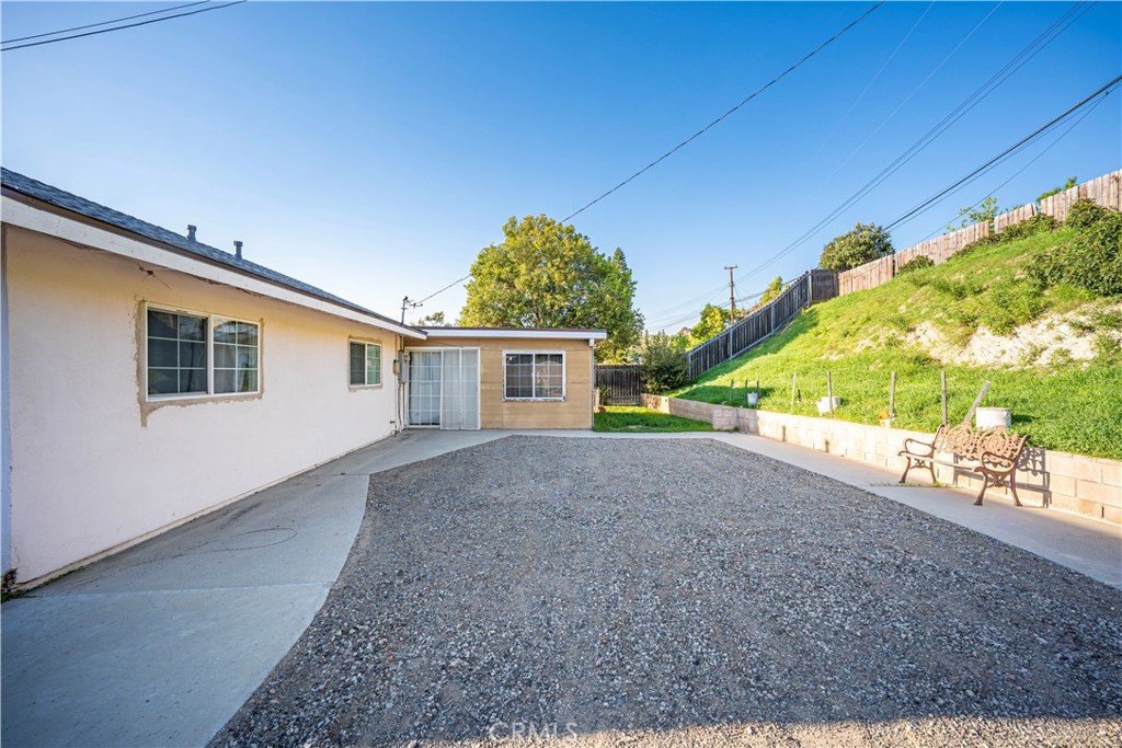3524 Whitingham Drive West Covina, CA 91792 - Photo 31 of 39 a view of a house with a yard and a garage