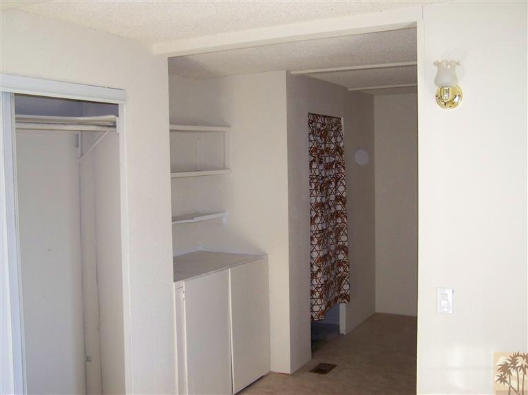 15303 Country View Road Whitewater, CA 92282 - Photo 18 of 25 a view of a hallway with window in a room