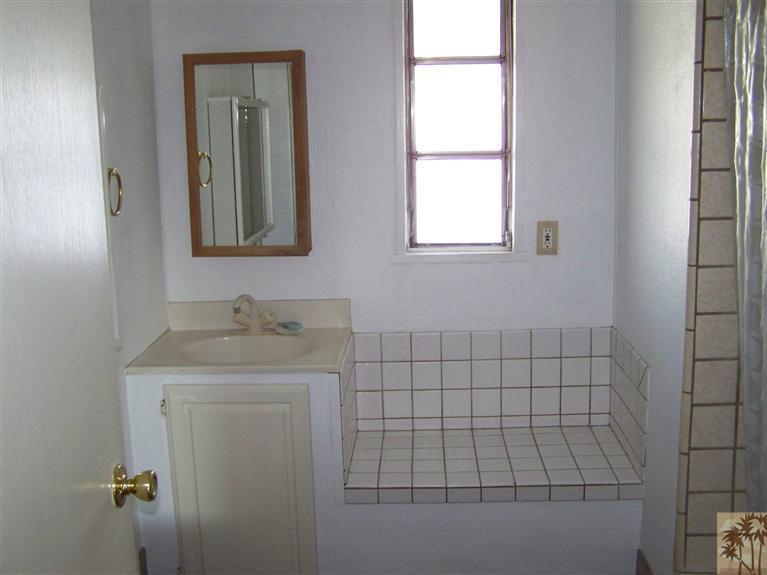 15303 Country View Road Whitewater, CA 92282 - Photo 20 of 25 a bathroom with a sink and a vanity