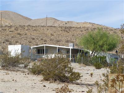 15303 Country View Road Whitewater, CA 92282 - Photo 3 of 25 a view of a house with a yard