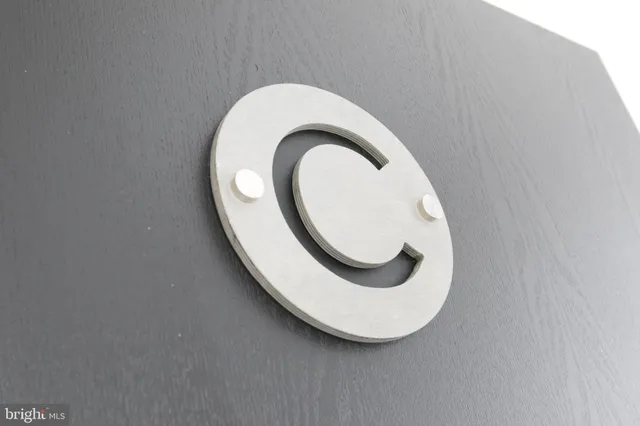 a kitchen with stainless steel appliances a microwave a sink a stove a refrigerator and cabinets