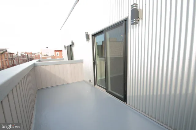 a view of a hallway with windows