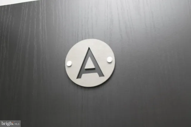 a kitchen with a sink stove and refrigerator