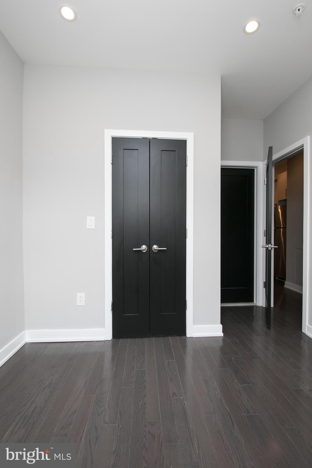 755 North Capitol Street Philadelphia, PA 19130 - Photo 7 of 47 a view of an empty room with wooden floor