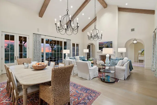 a kitchen with sink stove and refrigerator