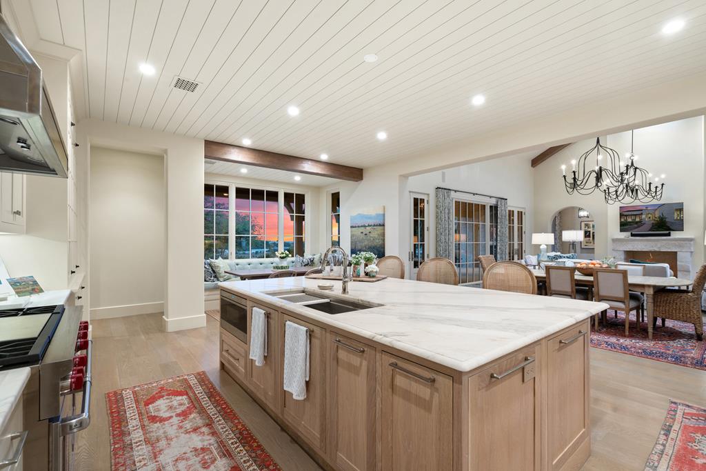 1691 Cool Water Ranch Road Fredericksburg, TX 78624 - Photo 16 of 33 a kitchen with sink stove and refrigerator