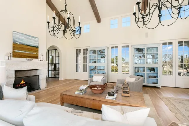 a bathroom with a double vanity sink a mirror and shower