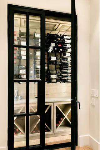 a bathroom with a shower sink and mirror