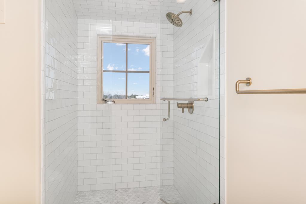 1691 Cool Water Ranch Road Fredericksburg, TX 78624 - Photo 31 of 33 a bathroom with a shower