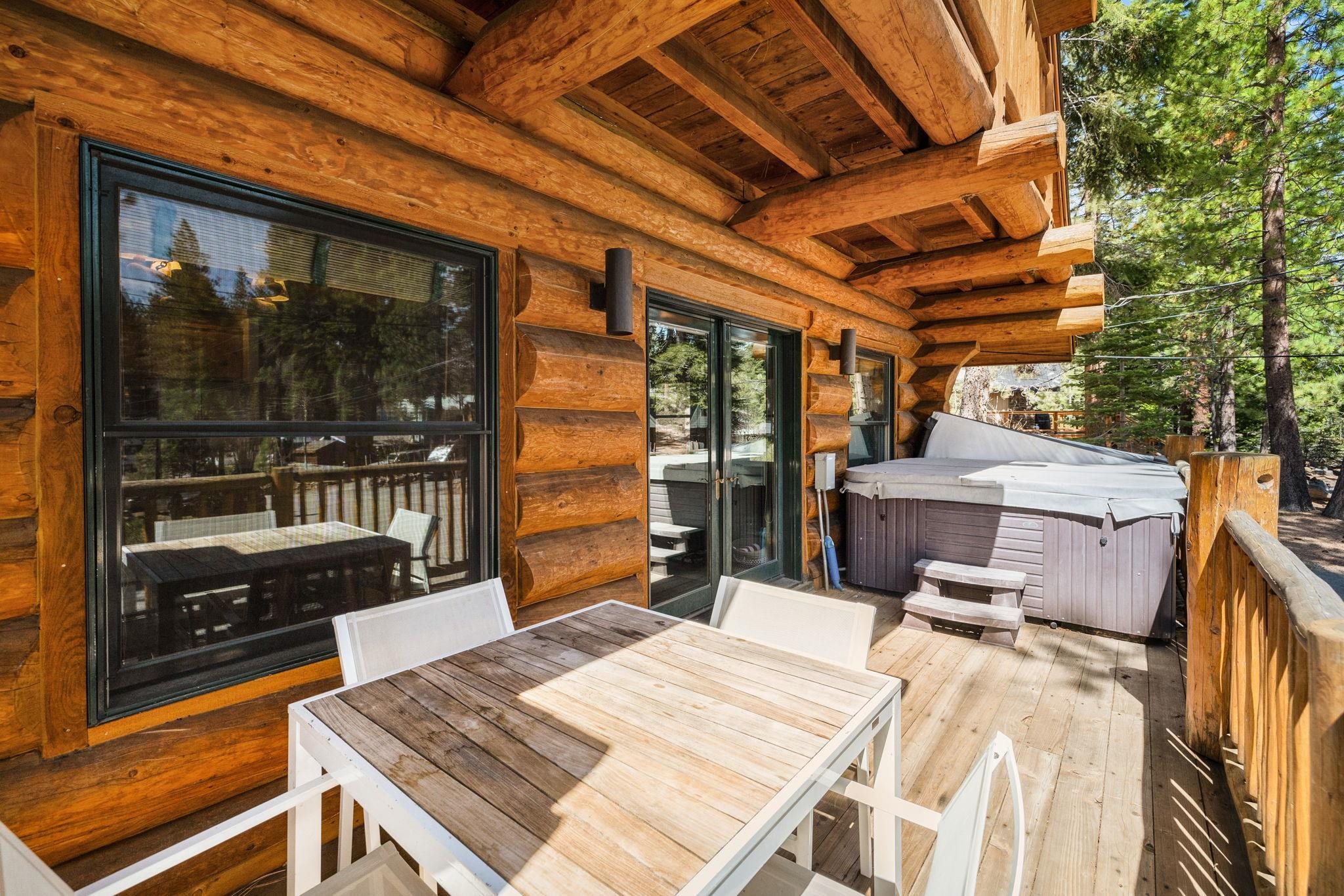 7883 Mashie Avenue Tahoe Vista, CA 96148 - Photo 15 of 28 a bed room with a bed and a window