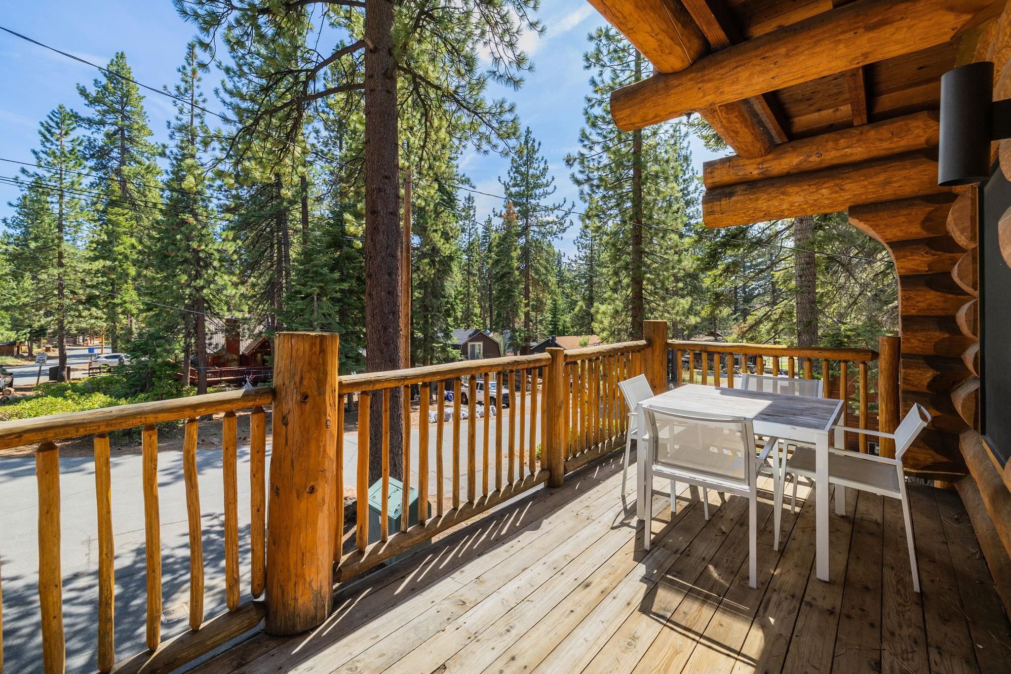7883 Mashie Avenue Tahoe Vista, CA 96148 - Photo 16 of 28 a view of a chair and tables on the roof deck