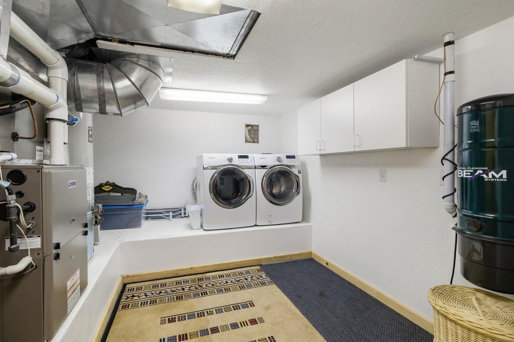 7883 Mashie Avenue Tahoe Vista, CA 96148 - Photo 24 of 28 a utility room with dryer and washer