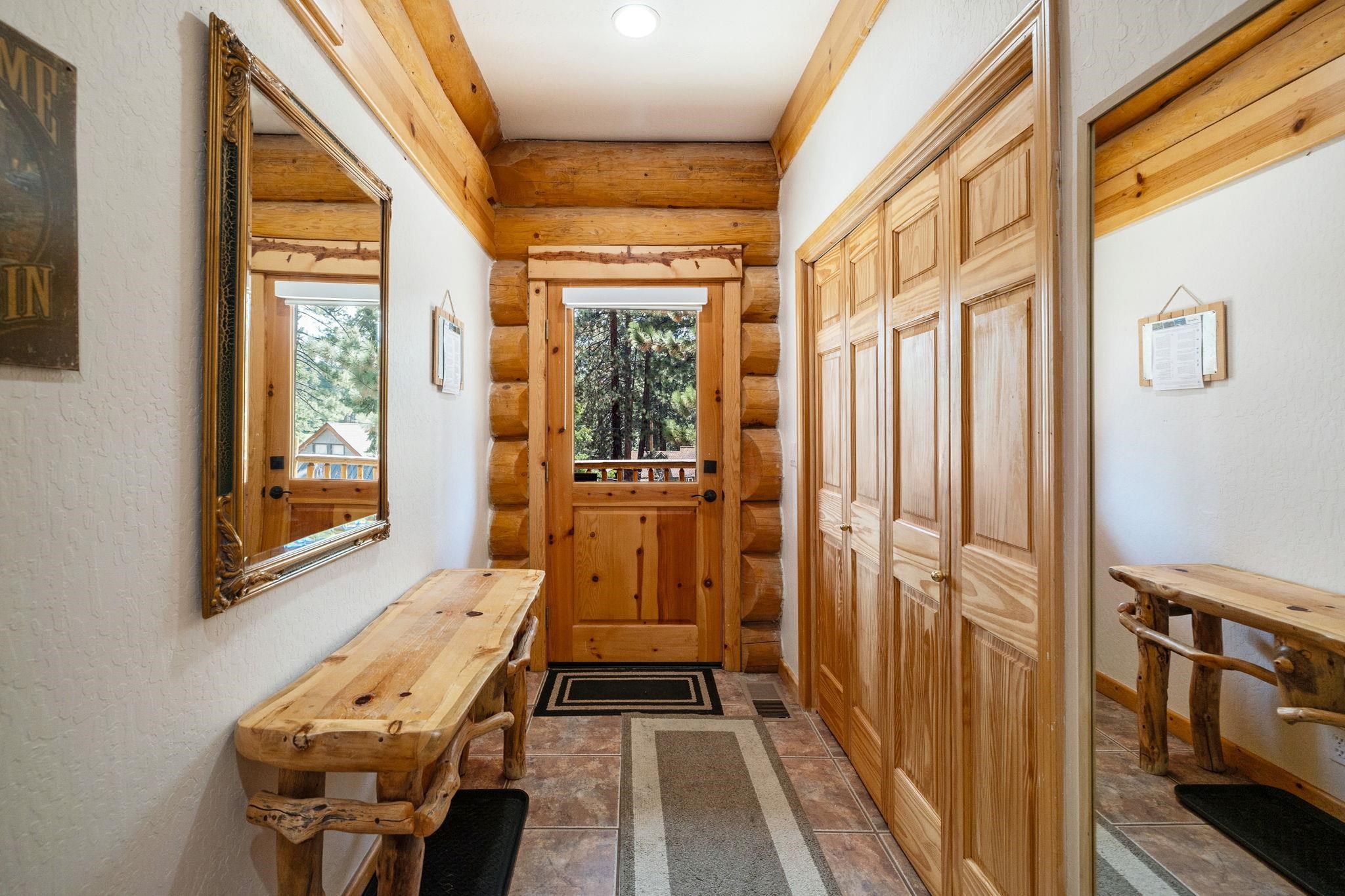 7883 Mashie Avenue Tahoe Vista, CA 96148 - Photo 4 of 28 a view of a balcony with wooden floor and furniture