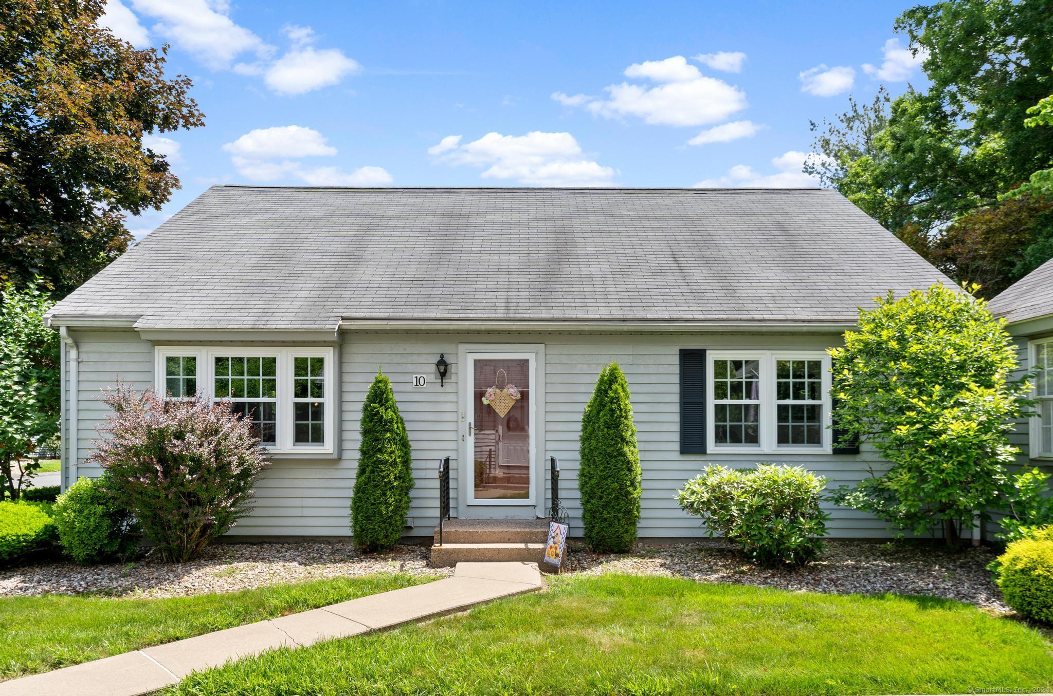 10 Canborne Way Suffield, CT 06078 - Photo 1 of 1 a front view of a house with garden