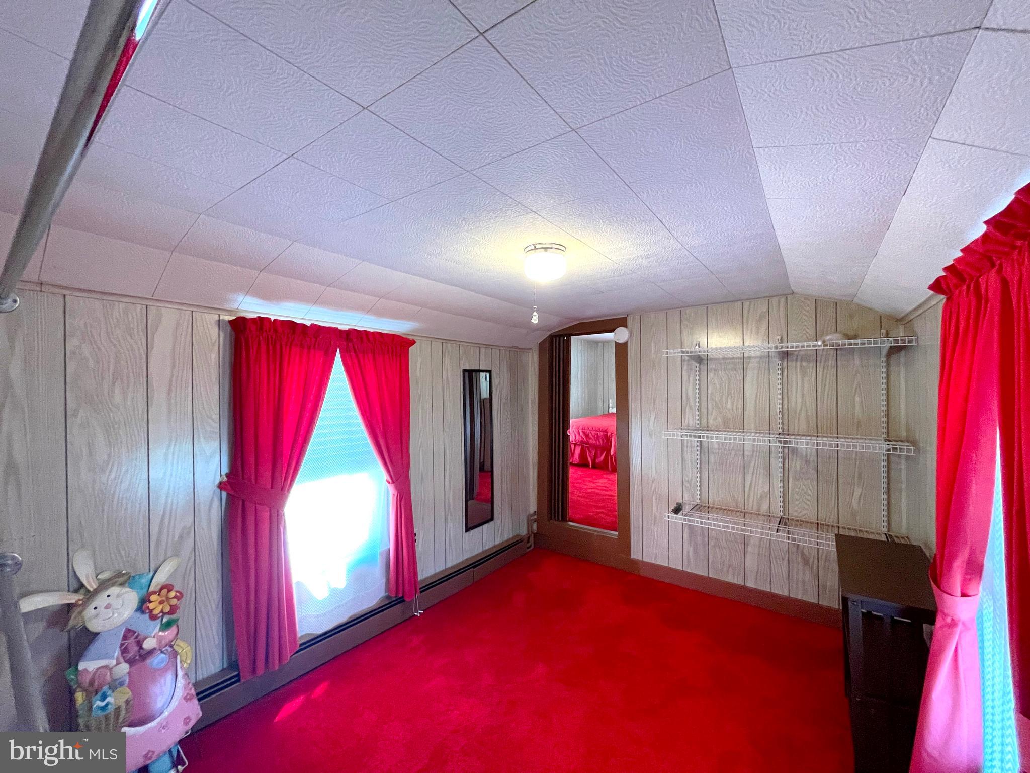 6700 Hungerford Road Bryans Road, MD 20616 - Photo 22 of 36 an empty room with windows