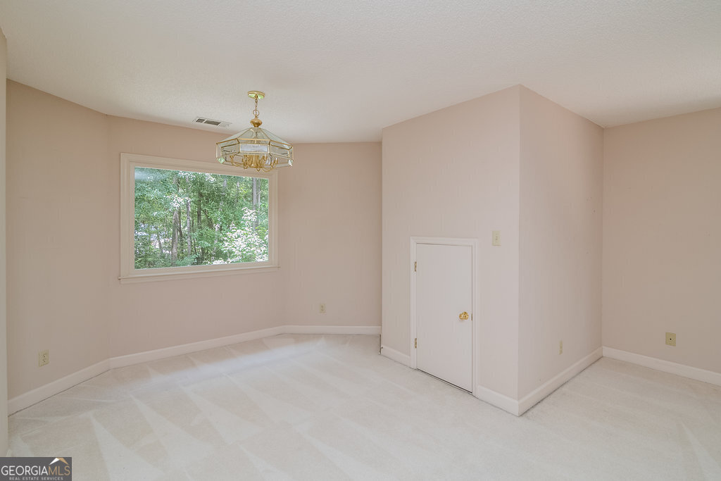 106 Baymeadow Point Savannah, GA 31405 - Photo 13 of 30 wooden floor in an empty room with a window