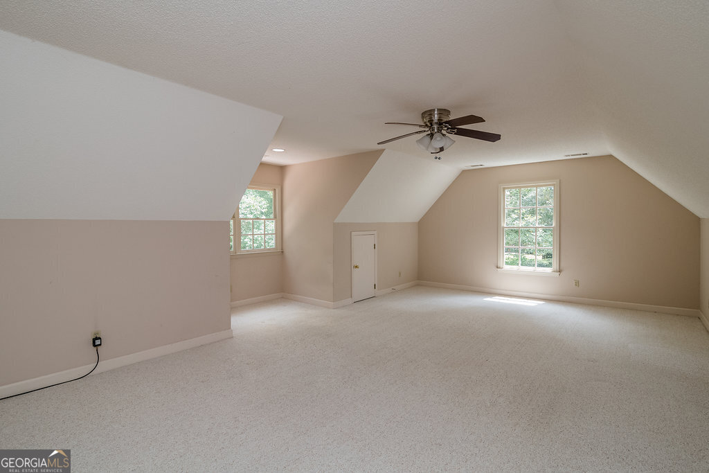 106 Baymeadow Point Savannah, GA 31405 - Photo 15 of 30 an empty room with windows and ceiling fan