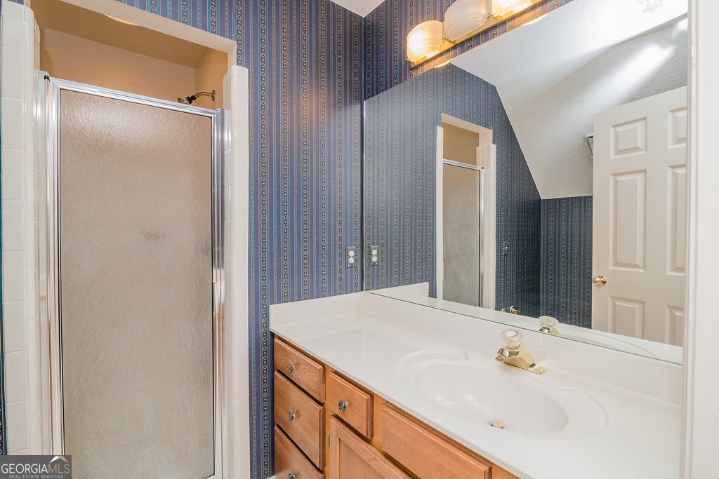 106 Baymeadow Point Savannah, GA 31405 - Photo 17 of 30 a bathroom with a sink and a mirror