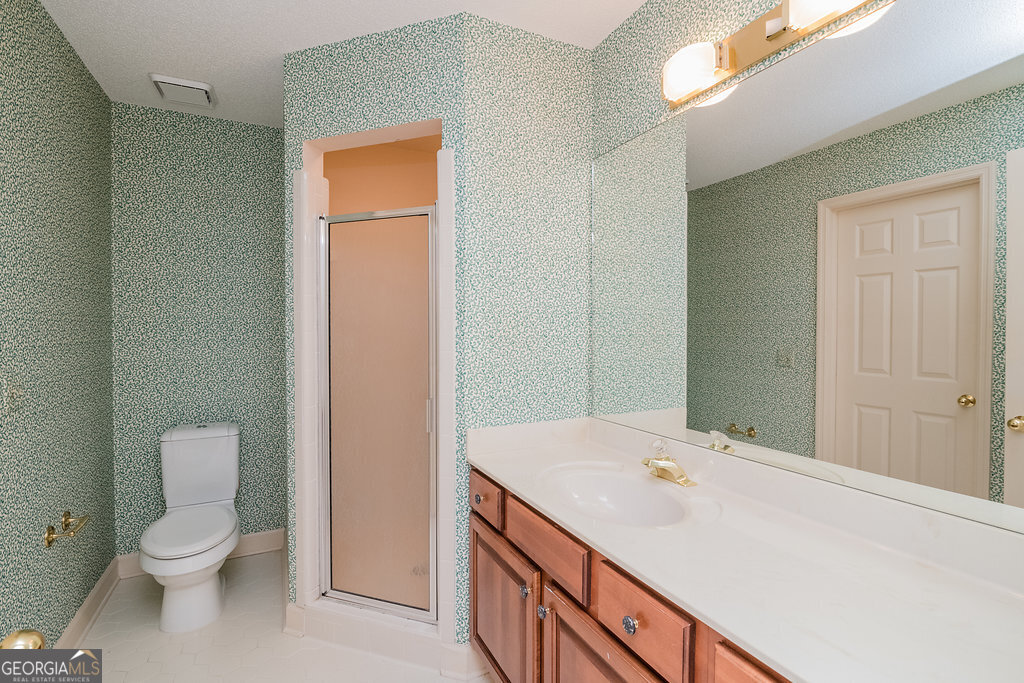 106 Baymeadow Point Savannah, GA 31405 - Photo 18 of 30 a bathroom with a toilet sink and vanity