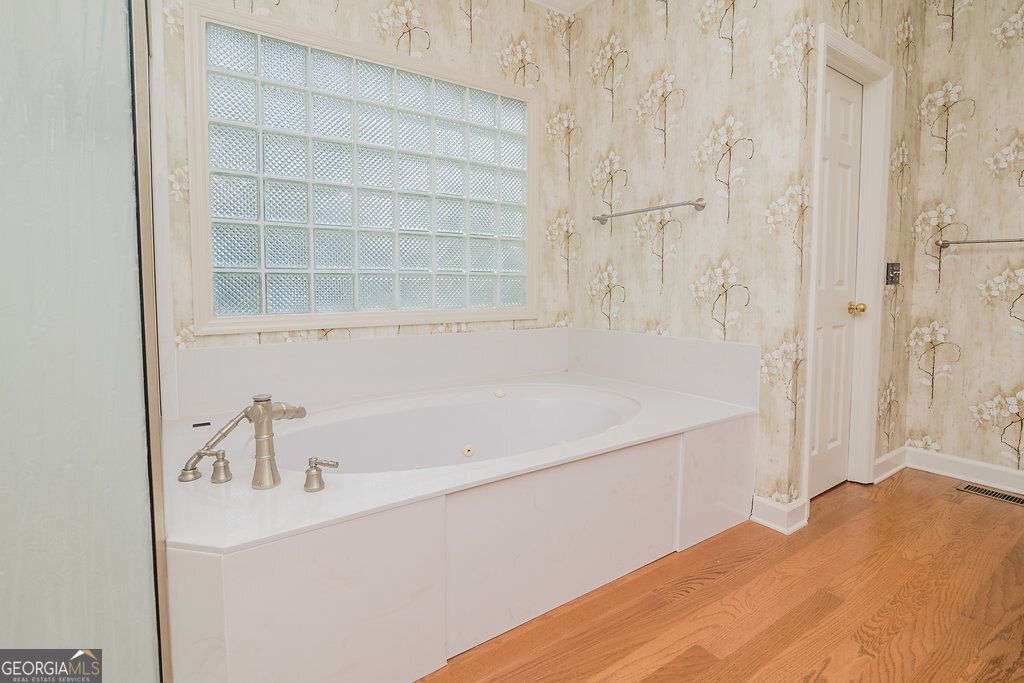 106 Baymeadow Point Savannah, GA 31405 - Photo 22 of 30 a bathroom with a bathtub and shower