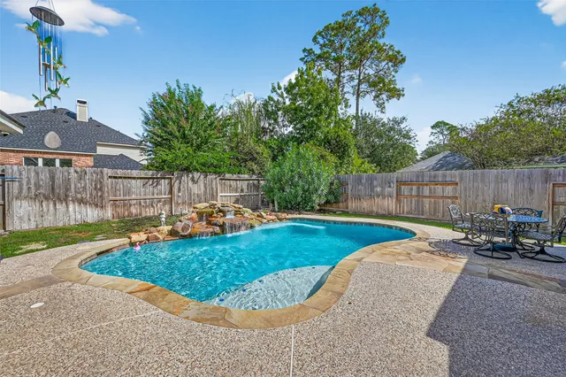 a view of a backyard with a patio